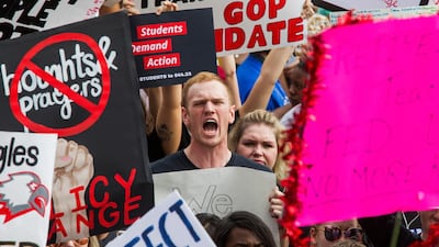 Protesters rally against gun violence on the steps of the old Florida Capitol in Tallahassee. Mark Wallheiser / AP Photo