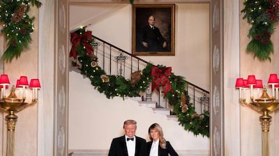 US President Donald Trump and First Lady Melania Trump suited up for their December 2020 Christmas portrait. Instagram / Melania Trump