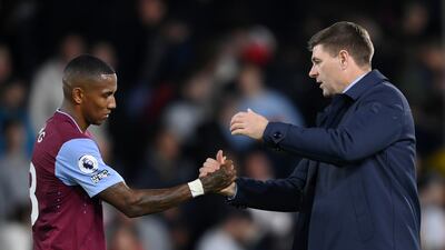 Steven Gerrard shakes hands with Aston Villa player Ashley Young at the final whistle. Getty Images