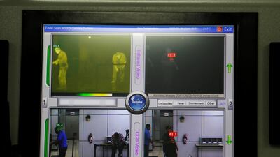 Images are seen in a thermographic imaging device to check the temperatures of arriving passengers at a quarantine station as preventive measure in light of the coronavirus outbreak in China, at the Oscar Arnulfo Romero International Airport in San Luis Talpa, El Salvador. REUTERS
