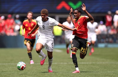Hamza Abdelkarim, left, came on for Mohamed Salah during Egypt's 1-1 draw against Belgium. AFP