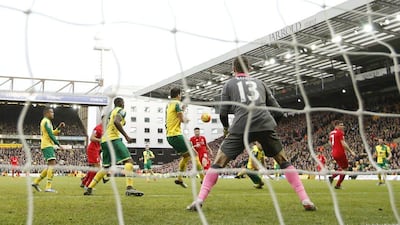 Adam Lallana scores the fifth and winning goal for Liverpool on Saturday against Norwich City in the Premier League. John Sibley / Action Images / Reuters