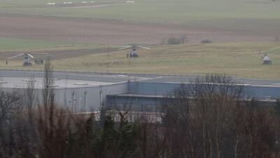 French police intervention force stand next to helicopters. Joel Saget / AFP Photo
