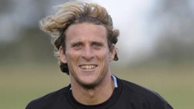 Diego Forlan has finally come into his own and will play for Uruguay against Brazil tonight.
