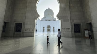 People visiting the mosque during Ramadan. Victor Besa / The National