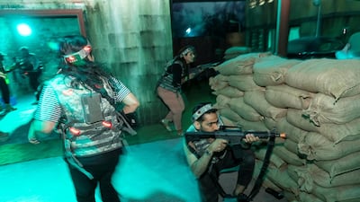 If shot, a player's vest vest lights up red, and they can get back to the home base for an ammunition refill. Photo: Antonie Robertson / The National