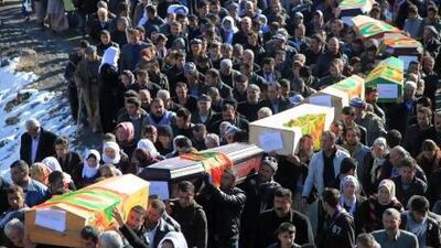 Thousands gather at the funerals of 34 Kurdish civilians who who were mistaken for Kurdish rebels and killed in a botched raid on December 30.