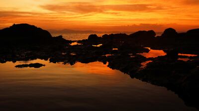 A sunset at the mouth of an estuary in the Bajamar area, west of San Jose, Costa Rica. EPA