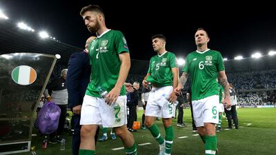 Left to right: Republic of Ireland's Matt Doherty, John Egan and Glenn Whelan after the final whistle. PA
