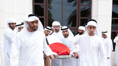 Sheikh Mohamed bin Zayed, Crown Prince of Abu Dhabi and Deputy Supreme Commander of the UAE Armed Forces, helps carry the body of his brother, Sheikh Sultan bin Zayed, after funeral prayers at Sheikh Sultan bin Zayed The First Mosque in Al Bateen. Wam