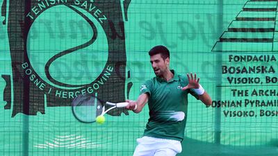 Novak Djokovic returns the ball during an exhibition match, organised to mark the opening of a tennis court at the "Archaeological park of the Bosnian pyramid" near Visoko, north of Sarajevo. AFP