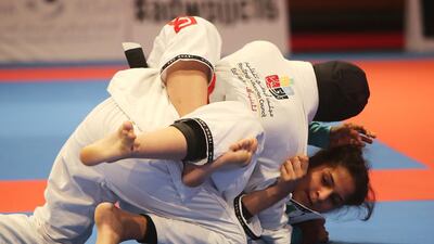 Fatima Al Marar of the UAE (on top) shown in her match with Asma Al Hosani of the UAE in the Abu Dhabi World Youth Jiu-Jitsu Championship 2016. Ravindranath / The National