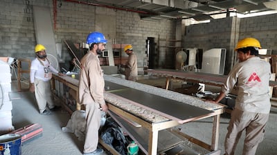 The community space on the ground floor takes shape. Pawan Singh / The National