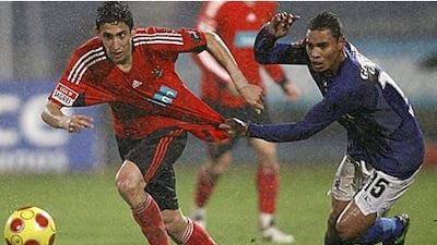 Benfica's Angel Di Maria, left, has drawn comparison with Portuguese heroes Figo and Simao.