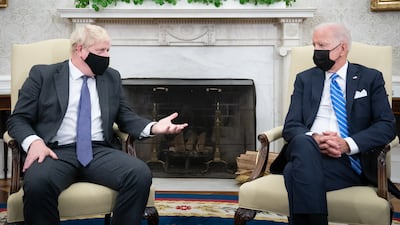 British Prime Minister Boris Johnson, left, meets US President Joe Biden in the Oval Office of the White House, Washington. PA