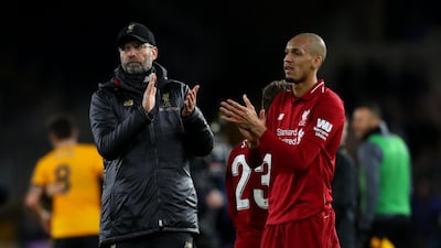 Fabinho, right, was used at centre-back against Wolves and may have to reprise the role against Brighton. Getty Images