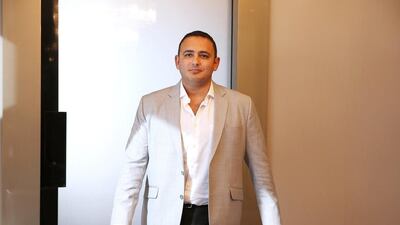 Fathi Ben Grira, the chief executive of Menacorp, finds his commute between Dubai and Abu Dhabi the most productive hours of the day. Pawan Singh / The National