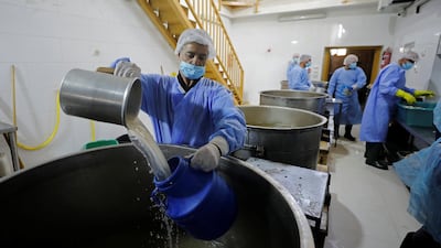 Palestinian workers cook free meals for the poor at a charity kitchen known as 'Prophet Ibrahim's Takiyya' in Hebron, in the Israeli-occupied West Bank. Reuters