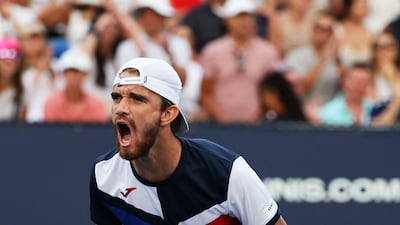 Tomas Machac celebrates his win against Andy Murray at the Hard Rock Stadium. AFP