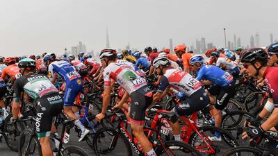 Cyclists ride during stage four of the UAE Tour. AFP