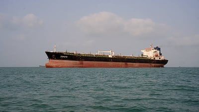 An oil tanker anchored in the Strait of Hormuz as the key channel remains virtually closed. Getty Images