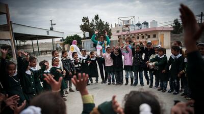 Nisreen Shawa, a worker for the Palestinian Medical Relief Foundation at the Hamza Bin Abd-el Muttalib School where they do art therapy and exercises with girls after the recent bombings.