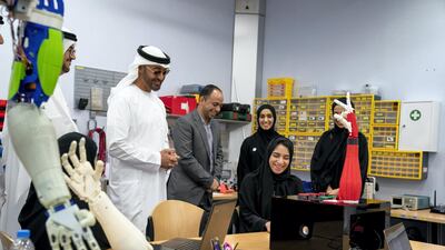 Sheikh Mohamed is shown robotics during the tour.