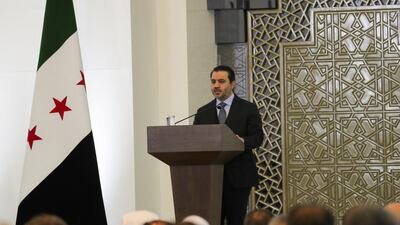 Syrian Foreign Minister Asaad Al Shibani speaks during the conference. Reuters