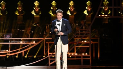 Eddie Redmayne accepts the award for Best Actor in a Musical. Getty Images