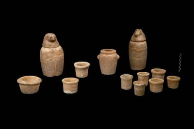 Canopic jars and ceremonial cups found inside the tomb of Wahibre-merry-Neith, a 26th dynasty ancient Egyptian military commander whose tomb was discovered in 2022 by a Czech archaeological mission working in Giza's Abusir necropolis. Photo: Ministry of Tourism & Antiquities
