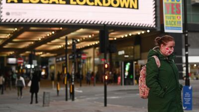 Shoppers in the retail district of Manchester city, north-west England. AFP