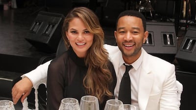 Model Chrissy Teigen and musician John Legend are expecting their first child together. The couple have been married for two years. Andrew Goodman / Getty Images for Celebrity Fight Night