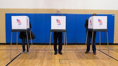 People stand in voting booths while voting in the 2018 mid-term general election at a polling station located at Deep Run High School in Glen Allen, Virginia. EPA