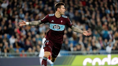 Celta striker Fedor Smolov celebrates after scoring the opening goal at the Bernanbeu. EPA