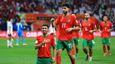 Karim El Berkaoui celebrates scoring Morocco's first goal in their 3-0 Fifa Arab Cup semi-final over the UAE at Khalifa International Stadium in Qatar. Reuters