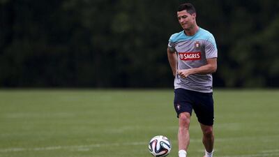 Cristiano Ronaldo shown during a Portugal training session on Tuesday at the facilities of the NFL's New York Jets as he works toward fitness for the 2014 World Cup. Jose Sena Goulao / EPA / June 4, 2014