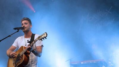 Bastian Baker’s mother tongue is French, but according to the Swiss singer, ‘singing and writing in English is a way for me to hide behind the lyrics’. Anthony Alex / EPA