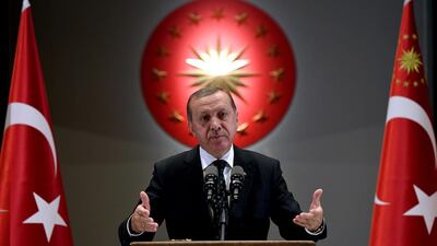 Turkish president Tayyip Erdogan makes a speech during an iftar event in Ankara, Turkey. Yasin Bulbul / Reuters