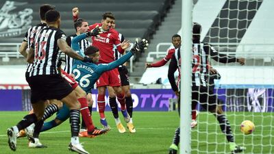 Liverpool's Brazilian midfielder Roberto Firmino heads wide during the match between Newcastle United and Liverpool at St James' Park in Newcastle. AFP