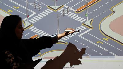 The instructor explains the theory of negotiating a cross-roads Ahmed Jadallah / Reuters