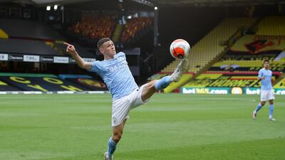 Phil Foden of Manchester City in action at Vicarage Road. Getty