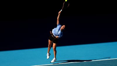 Ons Jabeur serves during a practice session at Melbourne Park. Getty