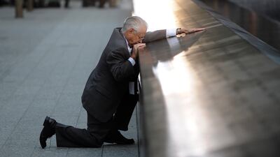 Robert Peraza, who lost his son Robert David Peraza, pauses at his son's name at the North Pool of the 9/11 Memorial during 10th anniversary ceremonies at the site of the World Trade Centre on September 11, 2011, in New York City. Getty Images
