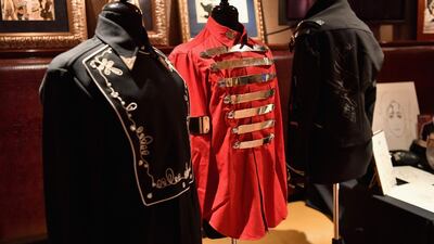 Michael Jackson shirts and a signed jacket are on display at the Icons & Idols: Rock-N-Roll press preview at Julien's Auctions at Hard Rock Cafe Times Square. AFP