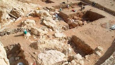 Handout photo provided by the journal Science shows the Jebel Faya rockshelter from above, looking north.