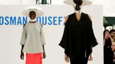 A model wears a creation by the designer Osman Yousefzada during London Fashion Week in Hyde Park.