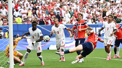 Torbjorn Heggem scores for Norway only for the goal to be disallowed for a foul by Erling Haaland for an earlier foul. Reuters