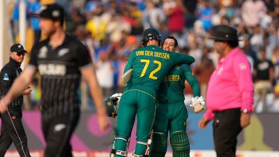 South Africa's Quinton De Kock celebrates his century with Rassie van der Dussen. AP