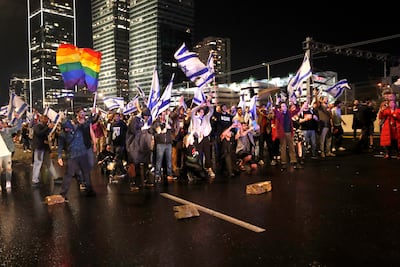 Demonstrators block a highway in protest against the government's justice system reform plans in Tel Aviv, on April 1. EPA