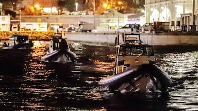 A handout picture provided by the British Ministry of Defence showing British Royal Marines who took part in the seizure of Grace 1, an Iranian oil tanker in the Gibraltar Strait. EPA